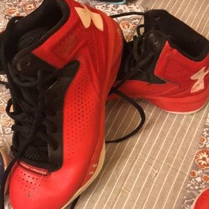 Women’s UA red/black basketball shoes. Size 8